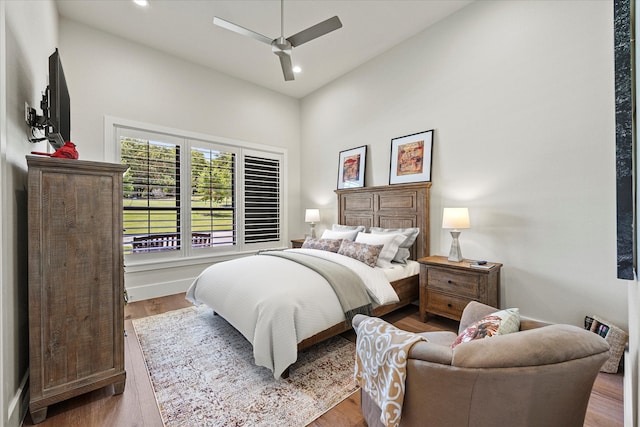 bedroom featuring ceiling fan and hardwood / wood-style flooring