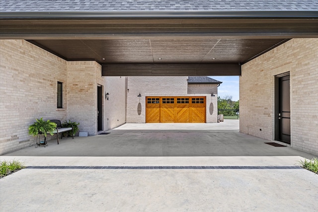 garage featuring a carport