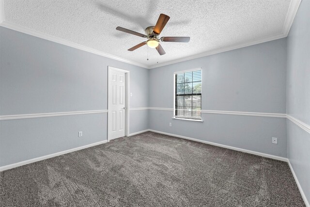 carpeted empty room with a textured ceiling, crown molding, and ceiling fan