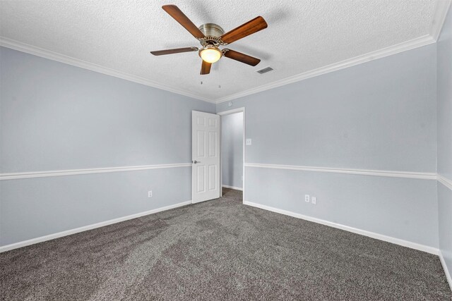 carpeted empty room with ornamental molding, a textured ceiling, and ceiling fan