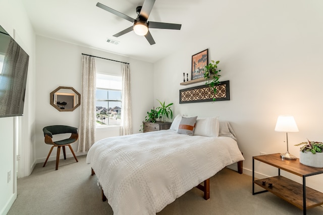 bedroom featuring ceiling fan and carpet floors