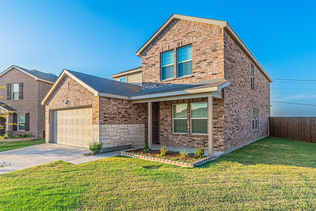 front of property featuring a garage and a front yard