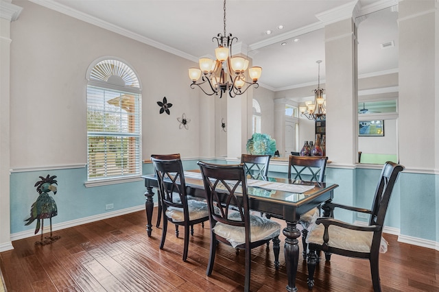 dining space with crown molding, dark wood-type flooring, and an inviting chandelier