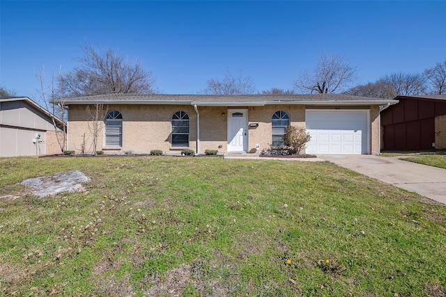 ranch-style home featuring a garage, a front yard, brick siding, and driveway