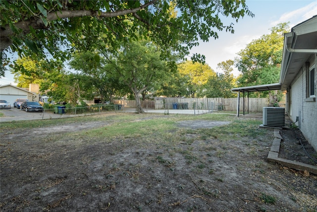 view of yard featuring central AC