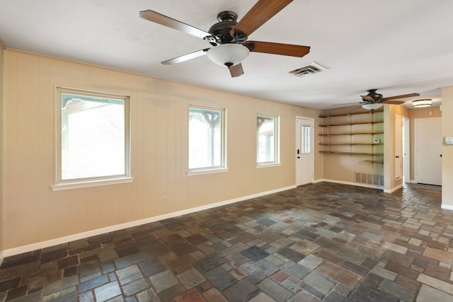 spare room featuring ceiling fan