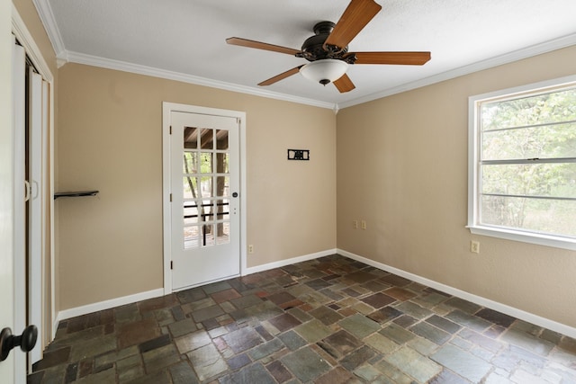 unfurnished room featuring plenty of natural light, crown molding, and ceiling fan