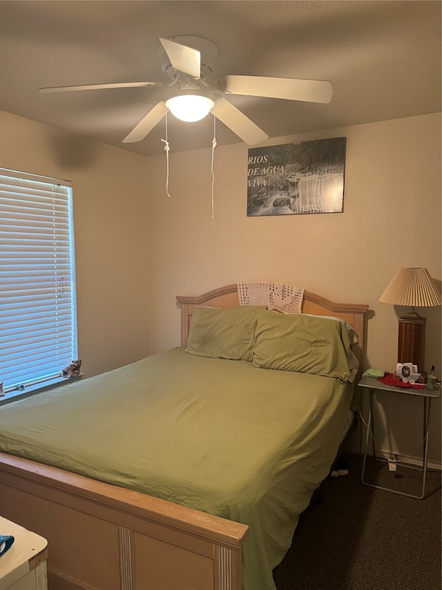 bedroom featuring ceiling fan