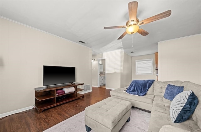 living room featuring ornamental molding, hardwood / wood-style floors, and ceiling fan