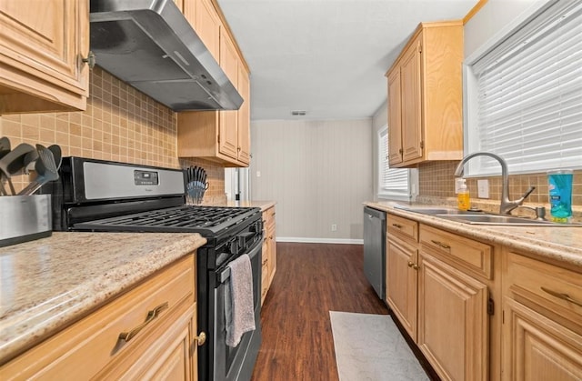 kitchen with backsplash, dark wood-type flooring, stainless steel dishwasher, sink, and black range with gas stovetop