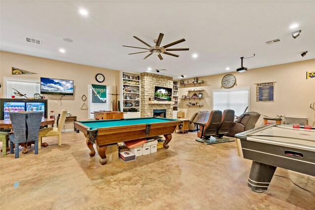 game room with billiards, brick wall, ceiling fan, and a fireplace