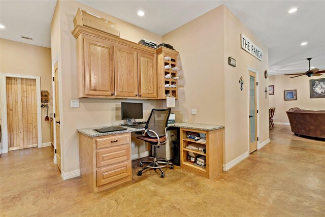 office featuring built in desk and ceiling fan