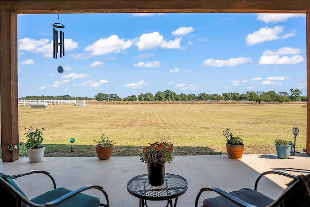 view of patio / terrace featuring a rural view