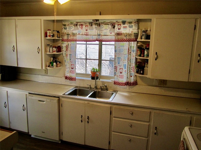 kitchen featuring dishwasher, sink, dark hardwood / wood-style floors, and white cabinetry