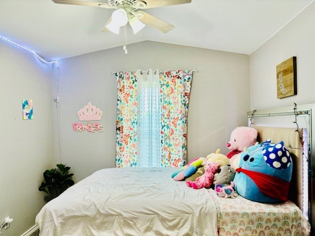 bedroom with lofted ceiling and ceiling fan