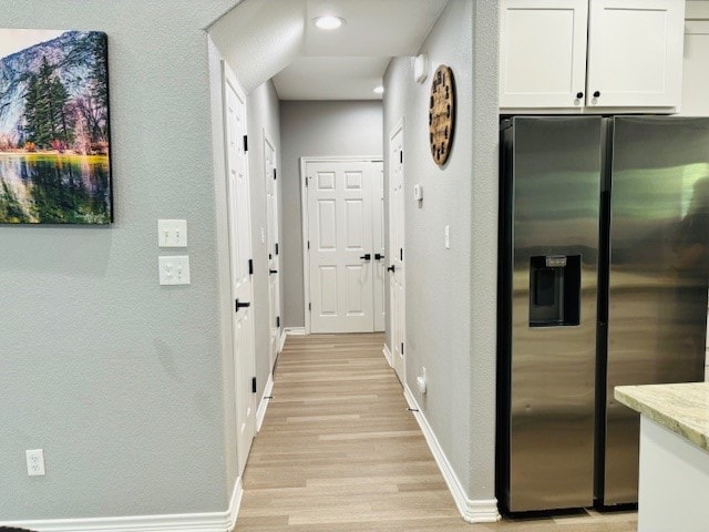 hall featuring light hardwood / wood-style floors