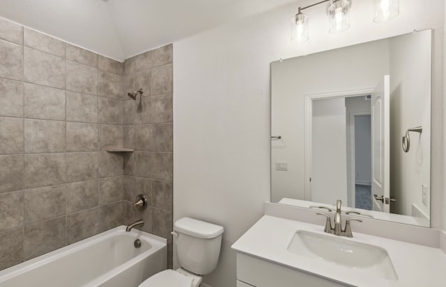 full bathroom with vanity, toilet, and tiled shower / bath