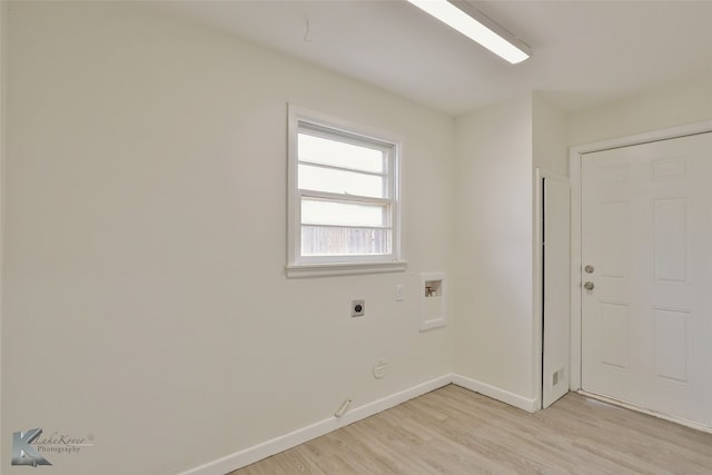 laundry room with light wood-type flooring, hookup for a washing machine, hookup for a gas dryer, and electric dryer hookup