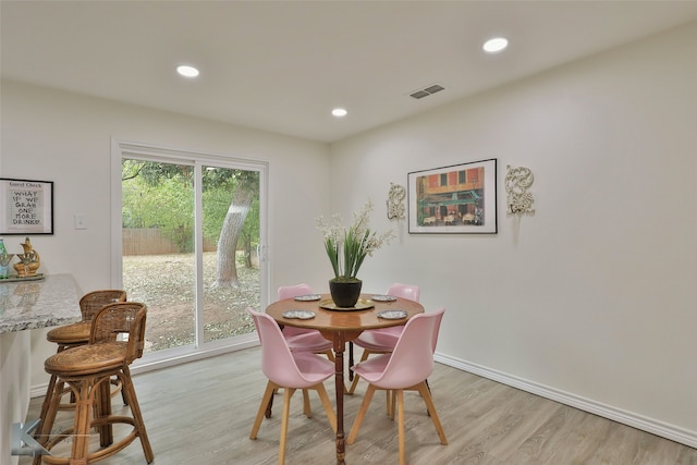 dining area featuring light hardwood / wood-style floors