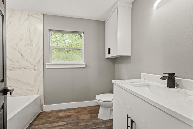 full bathroom with vanity, toilet, shower / bath combination, and hardwood / wood-style floors