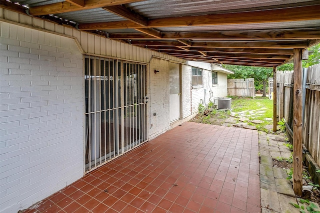 view of patio featuring fence and central air condition unit