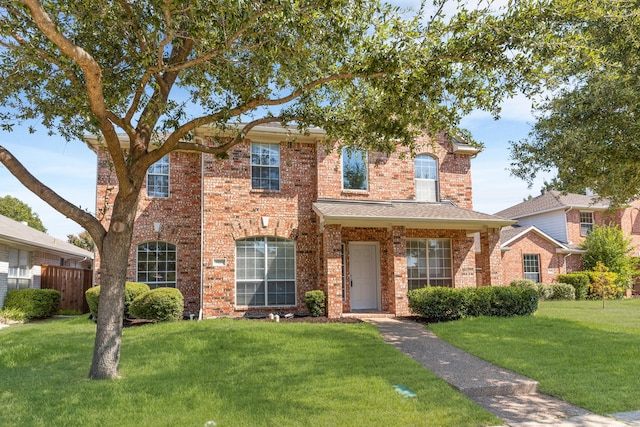 view of front of home with a front lawn