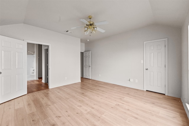 unfurnished bedroom featuring lofted ceiling, ceiling fan, and light hardwood / wood-style floors