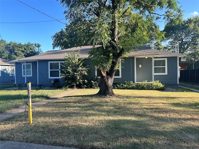 view of front of property with a front lawn