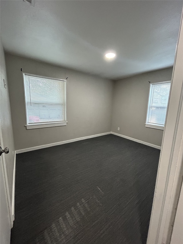 view of carpeted spare room