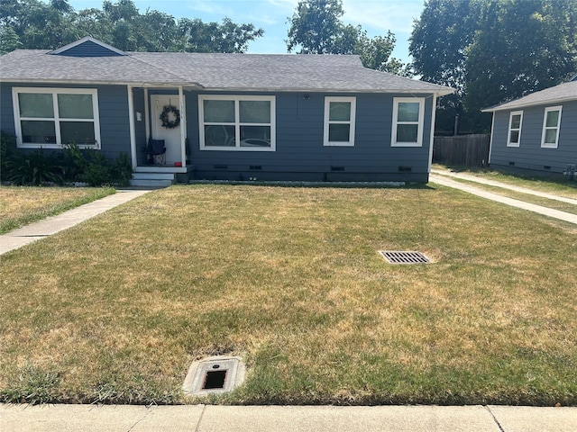 ranch-style home with a front yard