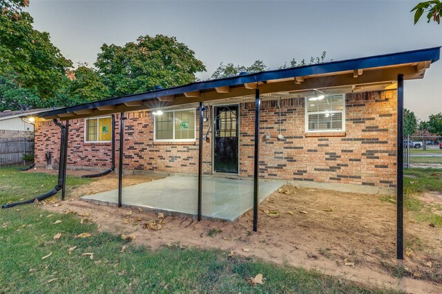 rear view of house featuring a patio area