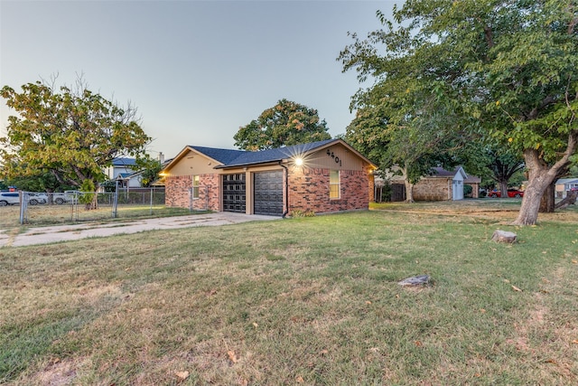 ranch-style house with a front lawn