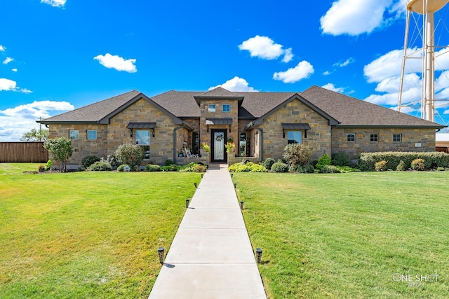 view of front of home with a front lawn