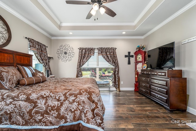 bedroom with a raised ceiling, ceiling fan, and crown molding