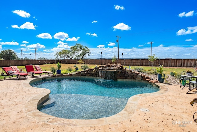 view of swimming pool featuring pool water feature