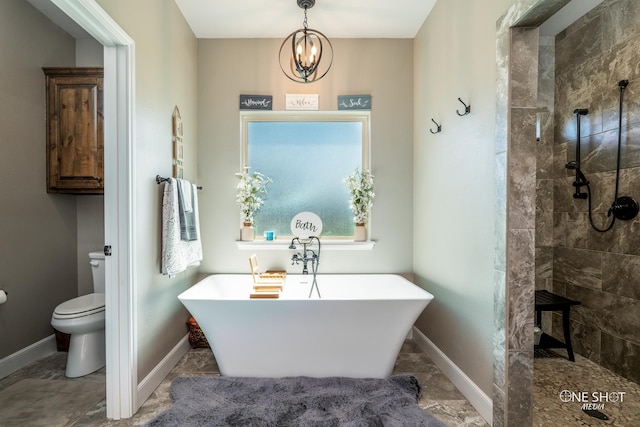 bathroom with separate shower and tub, toilet, and a chandelier