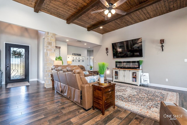 living room featuring beam ceiling, ceiling fan, wood ceiling, and dark hardwood / wood-style floors