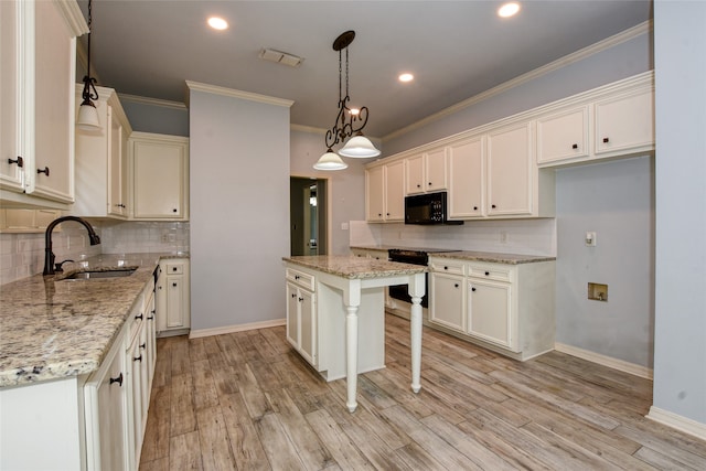 kitchen with light wood-type flooring, light stone counters, tasteful backsplash, a kitchen island, and stainless steel range with electric cooktop