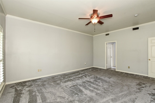 carpeted empty room featuring ceiling fan and ornamental molding