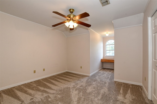 interior space featuring crown molding, vaulted ceiling, and ceiling fan