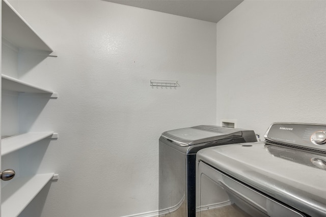 laundry area with laundry area and washing machine and dryer