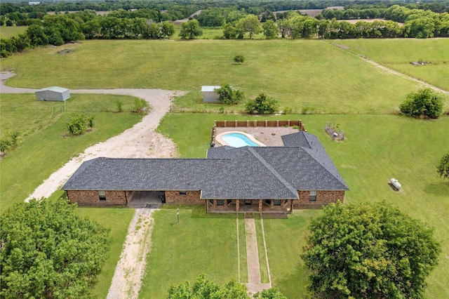 birds eye view of property featuring a rural view