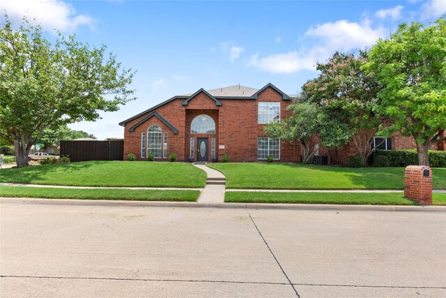 view of property with a front lawn