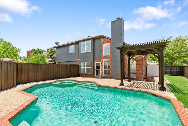 view of swimming pool featuring a pergola and a patio