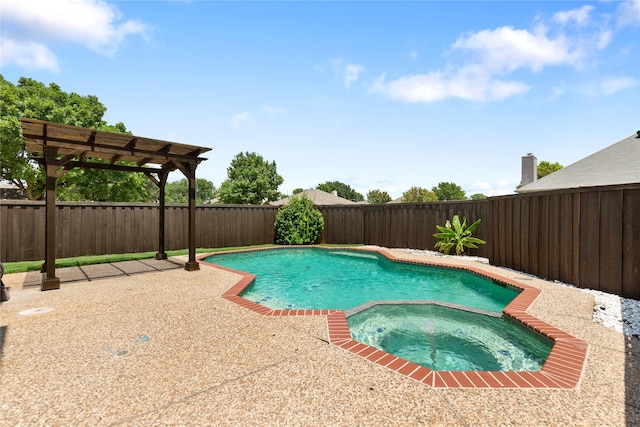 view of swimming pool with an in ground hot tub, a pergola, and a patio