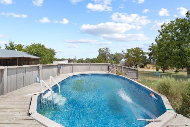 view of pool featuring a deck