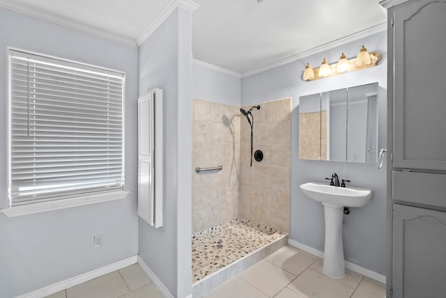 bathroom featuring ornamental molding, tiled shower, and tile patterned flooring