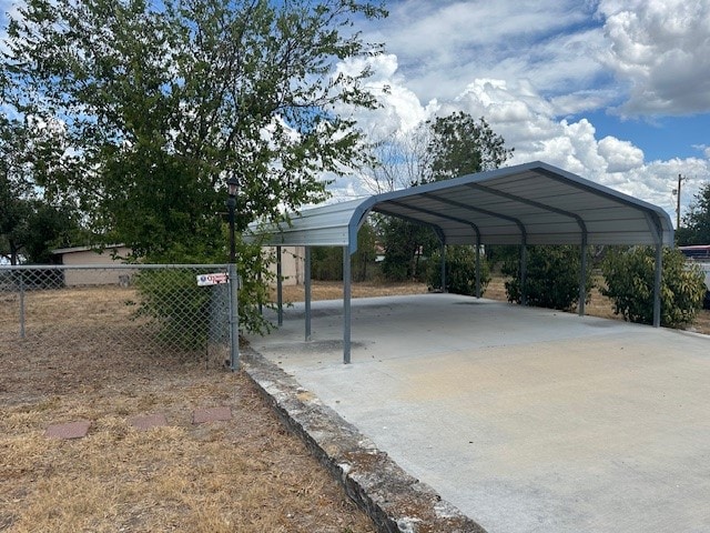 view of car parking featuring a carport