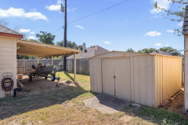 view of yard with a storage unit