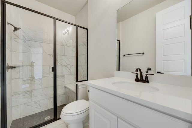 bathroom with an enclosed shower, vanity, and toilet